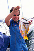 Girl 6 years, &Fresh fish, Miami, Florida, USA Children, People