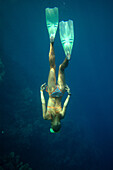 Woman underwater, freediving, Soma Bay, Hurghada, Egypt