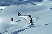 Snowboarders on mount Valluga, Arlberg Tyrol, Austria