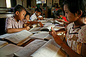 School children busy learning, Kinder lernen, Dorfschule