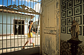 house entry with gate door and statue of Mary, Trinidad, Cuba