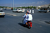 Scooter driver, Nizwa, Oman