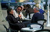 Sidewalk cafe in Saint Florent, Corsica, France