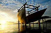 Fishing boat at sunset, Bora Bora, Polynesia