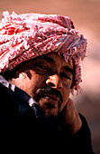 Portrait of a Bedouin man with headscarf, Petra, Jordan, Middle East