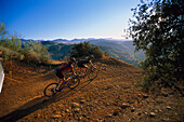 People mountainbiking on a lonesome track, Andalusia, Spain