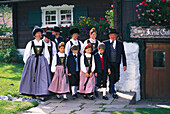 Family in traditional costumes, Lech am Arlberg, Vorarlberg, Austria, Europe