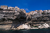 Houses at the steep coast under blue sky, Bonifacio, Corsica, France, Europe