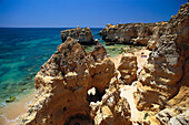 Beach with rocks in the sunlight, Albufeira, Algarve, Portugal, Europe