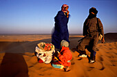 Touaregs in sandstorm, Erg Chebbi dunes, Sahara de, Merzouga, Sahara Morocco, North Africa