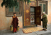 Gandan Chiid monastery, monk and women praying, Ulan Bator, Mongolia, Asia