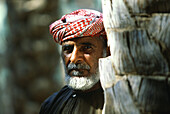 Mature man at Wadi Shab oasis, Wadi Shab, Oman, Middle East, Asia