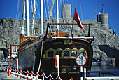 Old Dhau ship at Muscat harbor, Muscat, Oman, Middle East, Asia