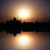 The Taj Mahal reflecting in the river at sunset, Agra, Uttar Pradesh, India, Asia