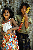 Girls selling incense sticks, Angkor, Siem Raep, Cambodia, Asia
