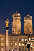 Statue of the Virgin Mary and Munich Cathedral on Marienplatz, Munich, Bavaria, Germany