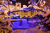 Winter attraction, ice rink at Karlsplatz, Stachus, Munich, Bavaria, Germany