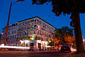 Colored building in Connewitz at night, Leipzig, Saxony, Germany