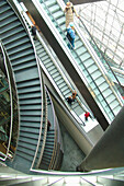 People on escalators, Petershof Shopping Center, Leipzig, Saxony, Germany