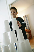 Boy building a tower