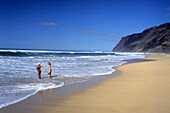 Women on Kauai Beach, Barking Sands Beach, Polihale State Park, Kauai, Hawaii, USA