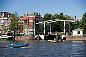Leisue Boats, Amstel, Bridge, Leisue boats on Amstel in the near of a lifting bridge, Amsterdam, Holland, Netherlands