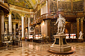 Ceremonial room with Karl VI. statue, National Library, Vienna, Austria