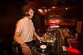 DJ playing record in the nightclub Roxy at Naschmarkt, Vienna, Austria