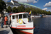 Passengers boarding a liner on Alster, Passengers boarding a liner on Inner Alster, Hamburg, Germany