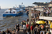 People at Landungsbrücken waiting for a ferry, People at Landungsbrücken waiting for a ferry, Sankt Pauli, Hamburg, Germany