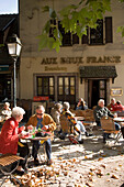 People sitting in a pavement cafe at Place Benjamin Zix, People sitting in a pavement cafe at Place Benjamin Zix, La Petit France Little France, , Strasbourg, Alsace, France