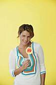Woman with a coloured lollipop