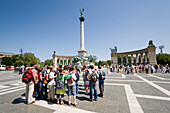 Tourists at Heroes' Square, Group of tourists visiting Millenary Monument at Heroes' Square, Pest, Budapest, Hungary