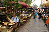 People in open-air cafes, People sitting in open-air cafes at Liszt Square, Pest, Budapest, Hungary