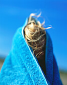 Little girl wrapped in towel