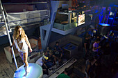Girl dancing in the Space Dance Mykonos Xperience Club, Mykonos-Town, Mykonos, Greece