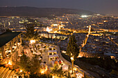 View from the Lykavittos Hill over the restaurant Orizontes to the ocean of houses of the town at night, Athens, Athens-Piraeus, Greece