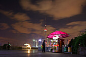 Bund, Huangpu River at night, umbrella covered stand, Shanghai
