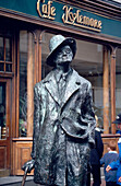 James Joyce bronze statue in front of Cafe Kylemore, Dublin, Ireland