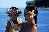 Mother and Daughter with Flowers in Hair,Muri Beach, Rarotonga, Cook Islands