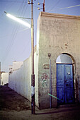 blue door, aswan, egypt