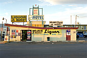 Store with lots of signs, Mojave Desert, California, USA