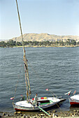 A sailing boat is moored at the bank of the nile, Luxor, Egypt