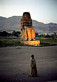 One of the two Colossi of Memnon, West Thebes, Luxor, Egypt