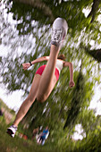 Woman jogging, low angle view