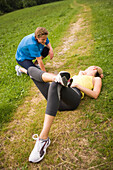 Young people resting after jogging