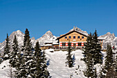 Snowy hill with ski lift station, summit of Dachstein Mountains at horizon, Hochwurzen, Schladming, Ski Amade, Styria, Austria