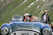 Couple kissing in 1966 Austin Healey 100/6 Silverstone, Silvretta Classic Rallye, Montafon, Vorarlberg, Austria