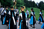 women wearing dirndl dresses, pilgrimage to Maria Eck, Siegsdorf, Chiemgau, Upper Bavaria, Bavaria, Germany