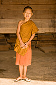 Portrait of a young Buddhist monk, Wat Pa Luangta Bua Yannasampanno Forest Monastery, Tiger Temple, Kanchanaburi, Thailand